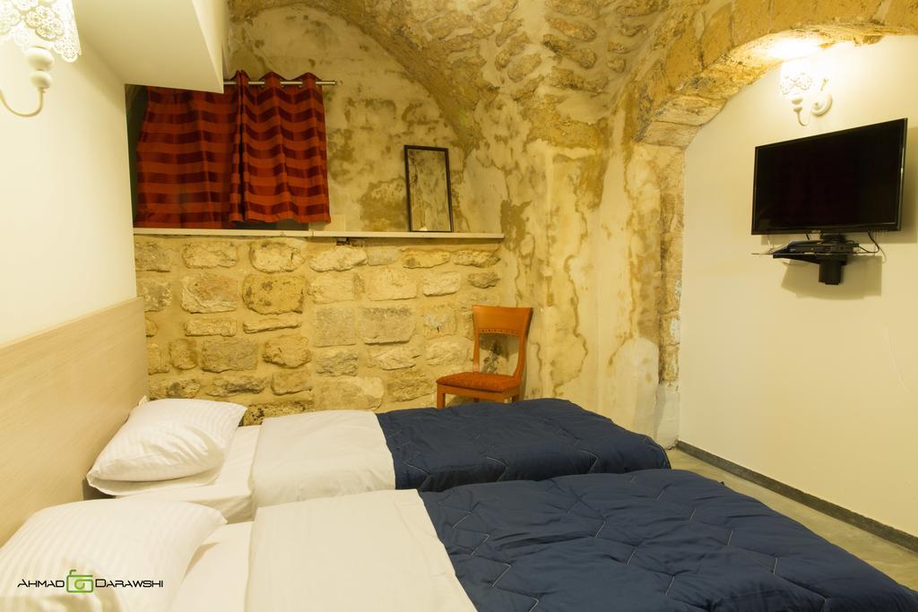 Al-Hakim Boutique Hotel Old Town Назарет Номер фото